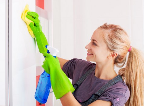 Domestic cleaner preparing a home cleaning visit in an Acton property