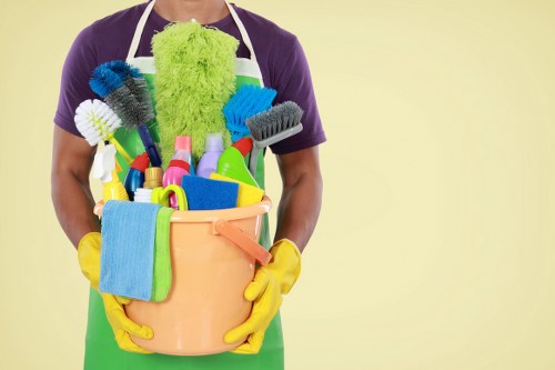 Local cleaning team handling post-build dust in Acton