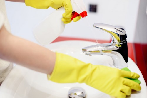 Cleaning team using separated recycling bins in Acton